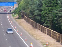 Acoustic Green Barrier in woven willow absorbing noise from dual carriageway